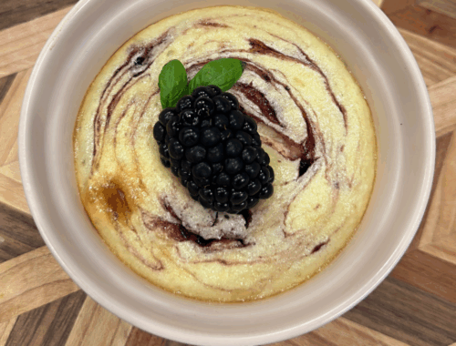 mini blackberry cheesecake in a ramekin